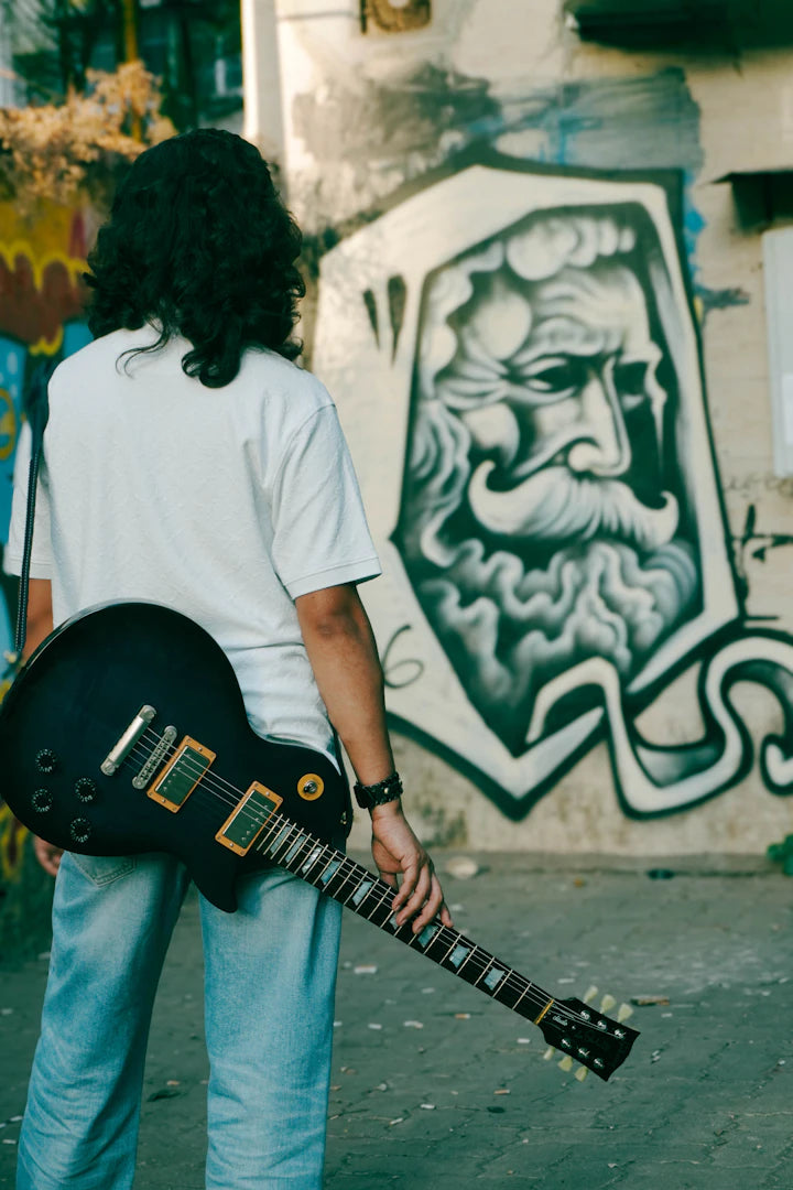 Artistic T-Shirts Celebrating Guitar Culture and Craftsmanship